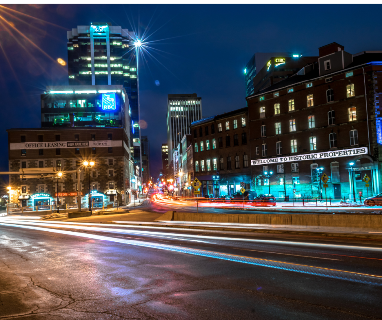 Downtown Halifax , Nova Scotia at night with blurred headlights