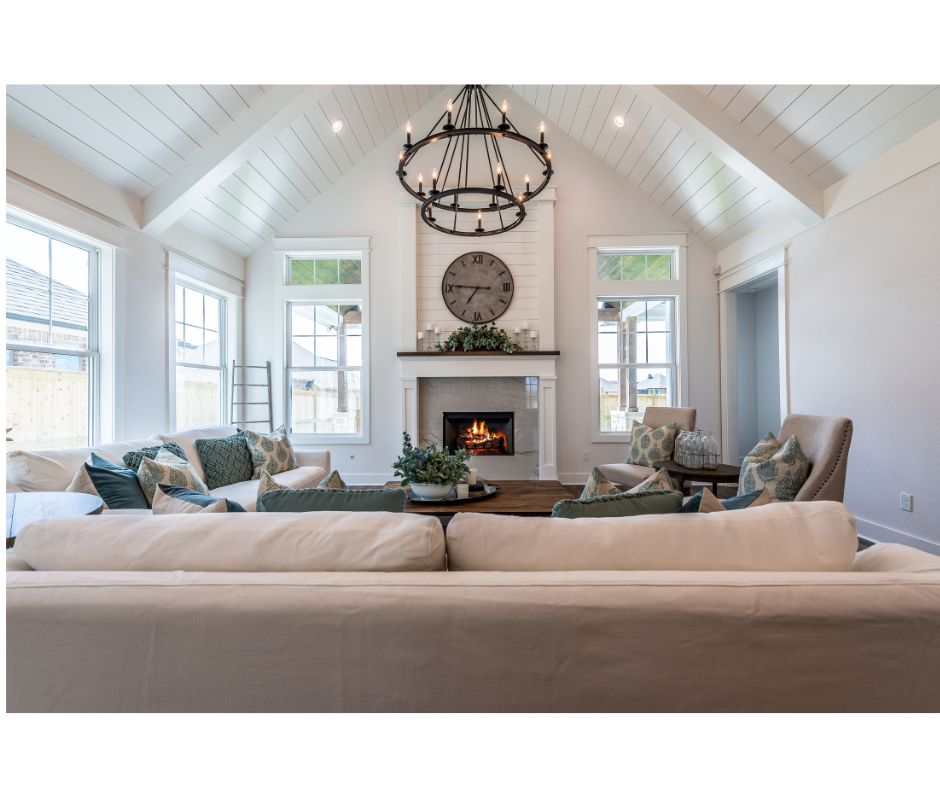 living room with fireplace and vaulted ceiling